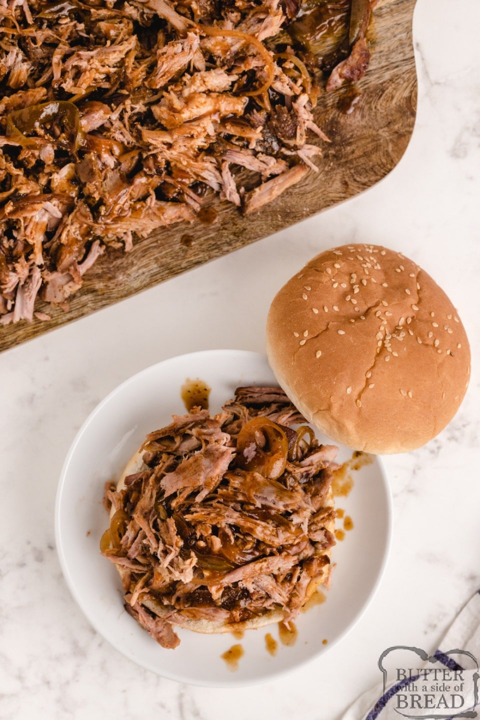 Slow Cooker BBQ Pulled Pork is moist, tender and packed with flavor. This simple crockpot pulled pork recipe is perfect for sandwiches, or even just served over rice.