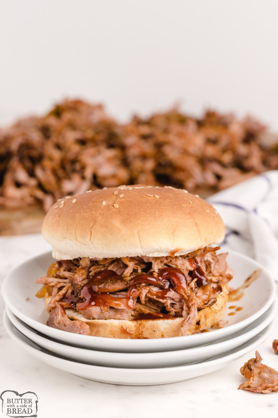 Slow Cooker BBQ Pulled Pork is moist, tender and packed with flavor. This simple crockpot pulled pork recipe is perfect for sandwiches, or even just served over rice.