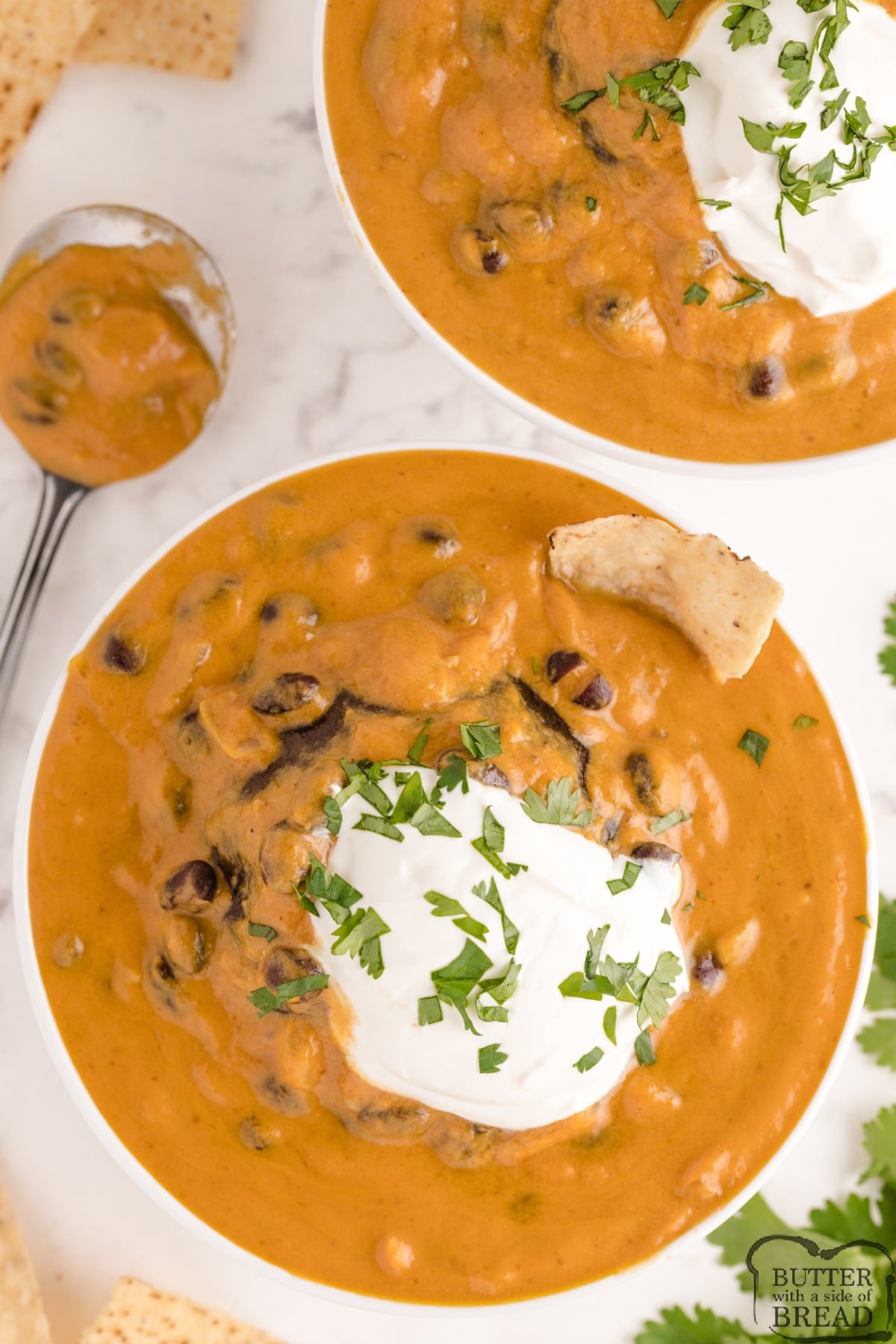 Easy Pumpkin Soup made in less than 20 minutes with a can of pumpkin, black beans and lots of flavor! Delicious homemade pumpkin soup recipe that is creamy, healthy and delicious!