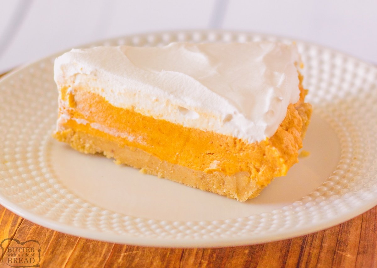 side shot of a slice of no bake marshmallow pumpkin pie