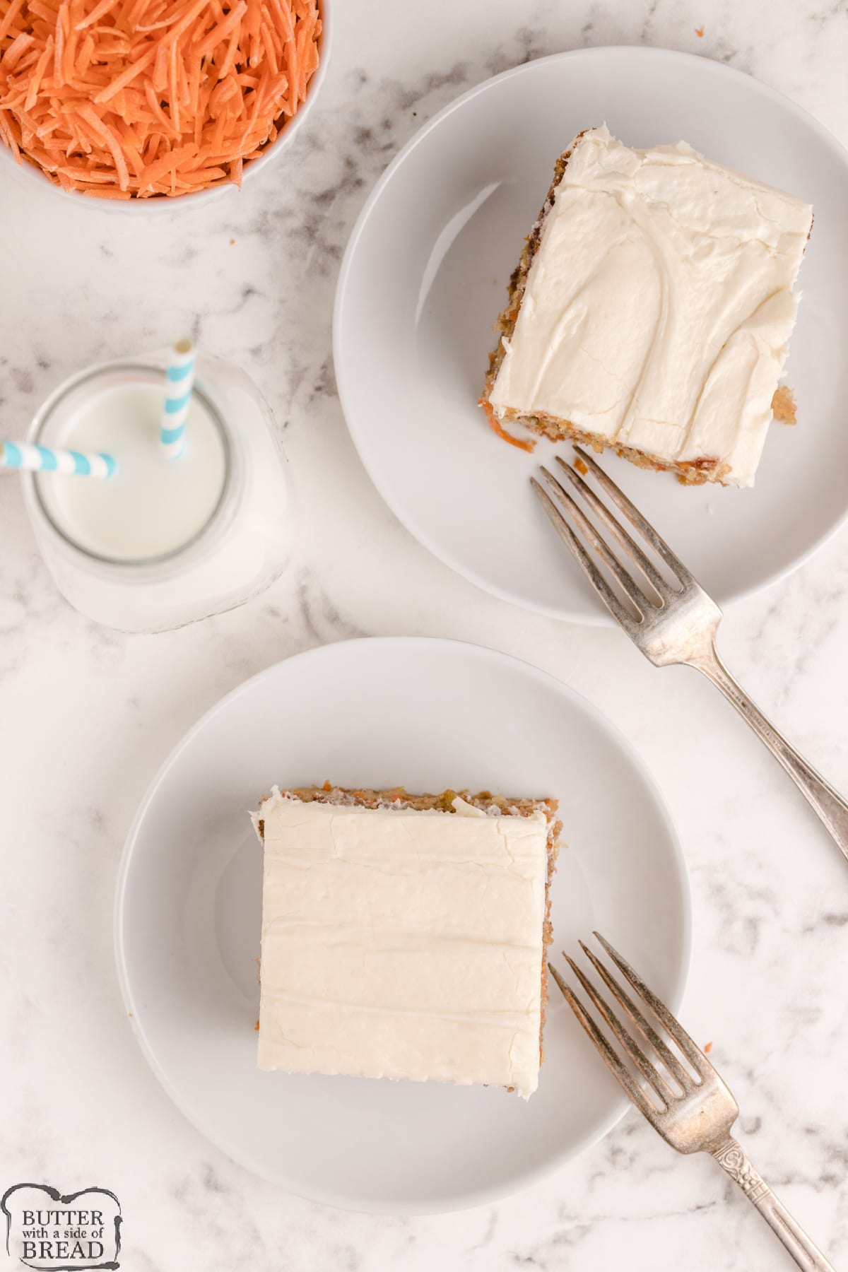 Slices of carrot cake with cream cheese frosting