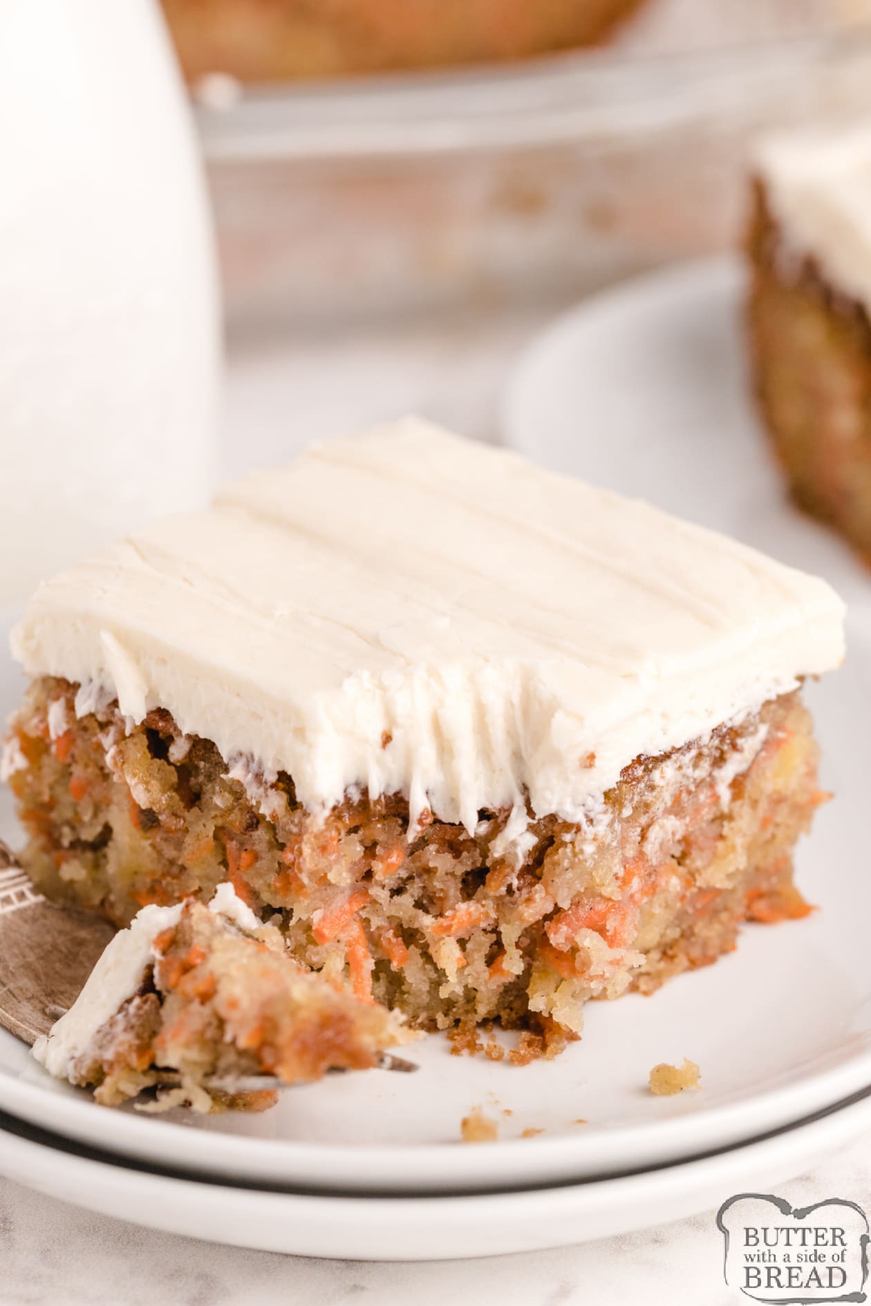 est Carrot Cake recipe that is moist, delicious and made with crushed pineapple and shredded carrots. The homemade cream cheese frosting pairs perfectly with this carrot cake recipe.