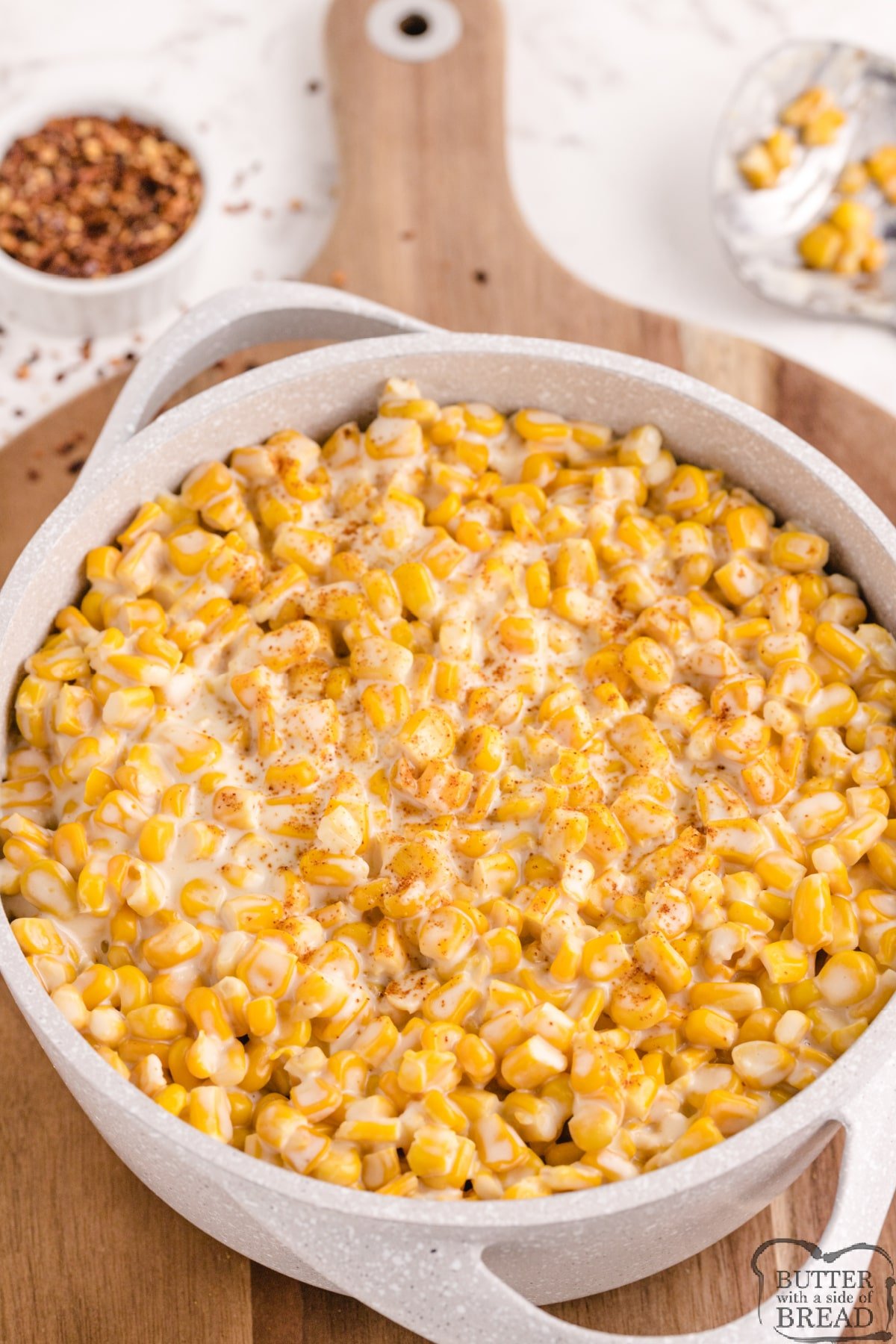 Homemade Creamed Corn made with frozen corn and whipping cream. This creamed corn recipe is a delicious side dish that can be made in just a few minutes! 