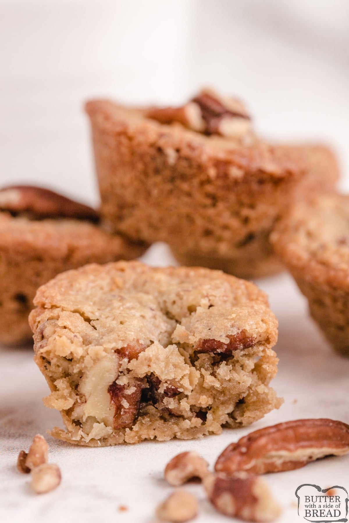 Pecan Pie Mini Muffins made with only 5 ingredients can be served as a side or a dessert! Tastes like pecan pie in the form of a bite sized muffin!  