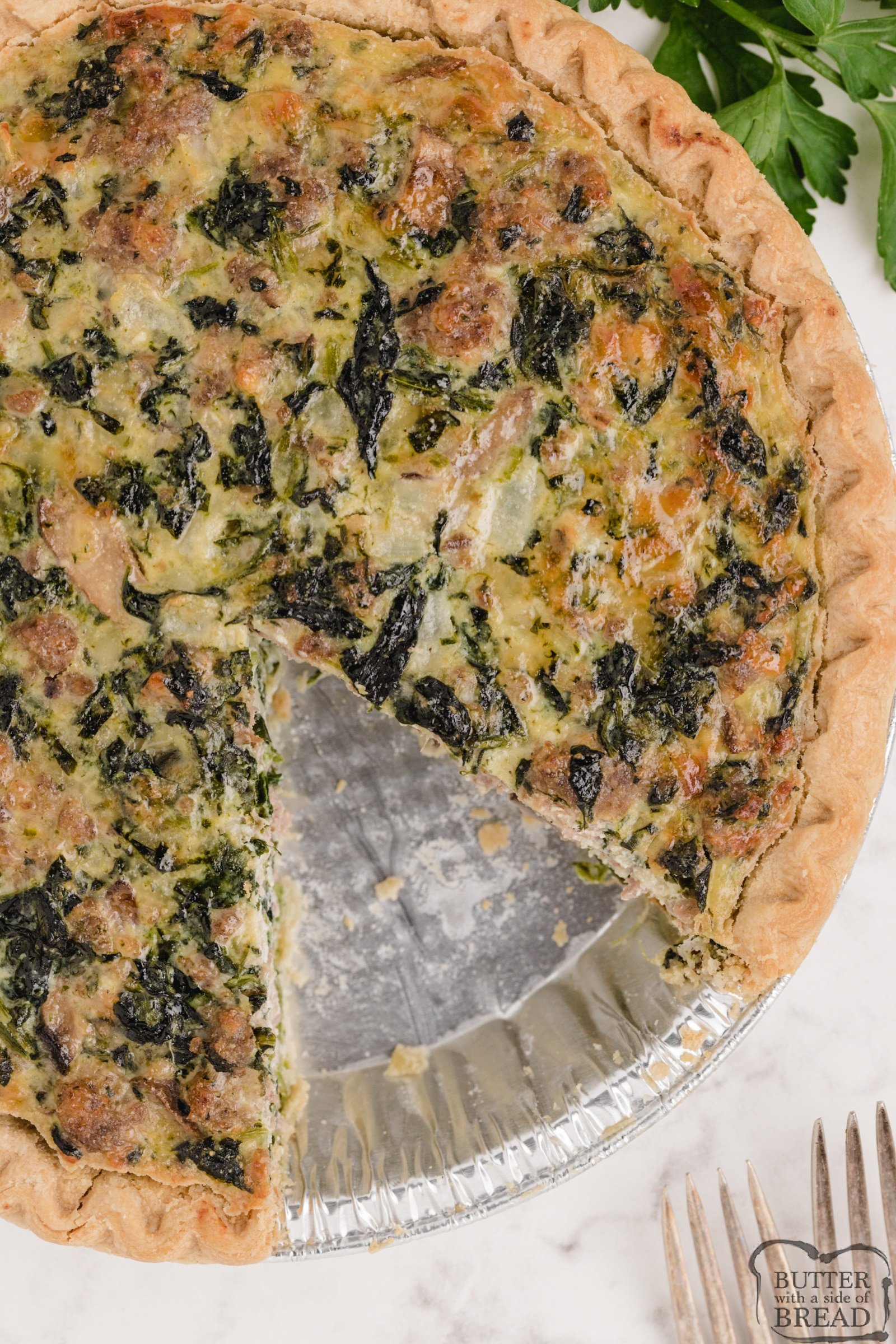 Easy quiche recipe made with spinach, mushrooms, sausage and cream