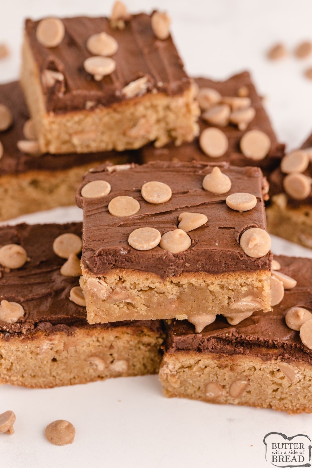Peanut Butter Blondies are thick and chewy peanut butter bars topped with a homemade chocolate frosting. 