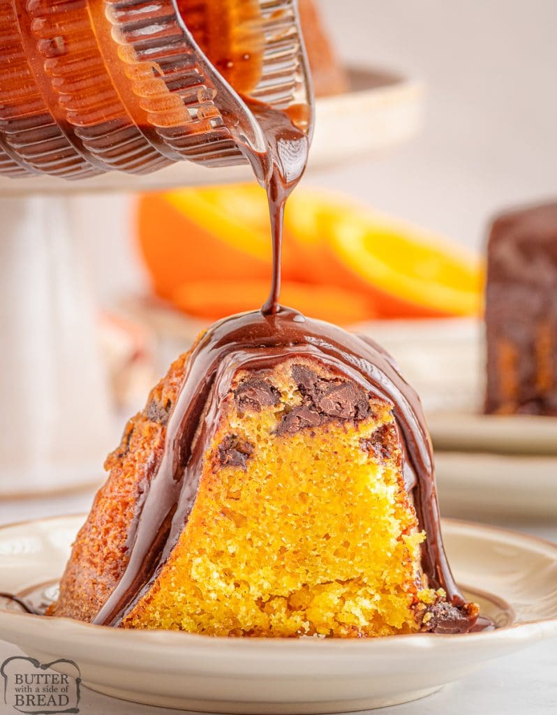 slice of chocolate orange bundt cake drizzled with chocolate