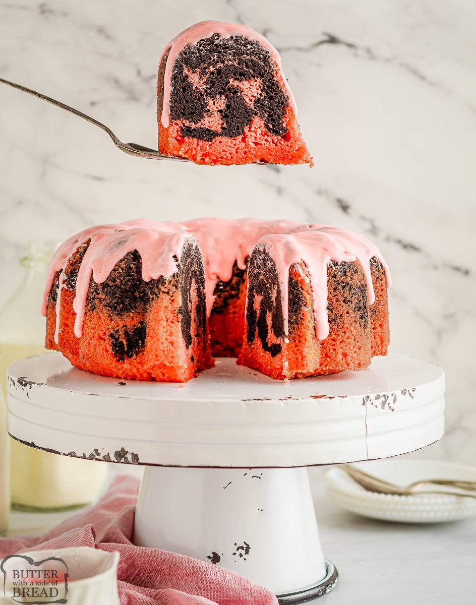 pretty slice of pink and brown chocolate strawberry swirled bundt cake