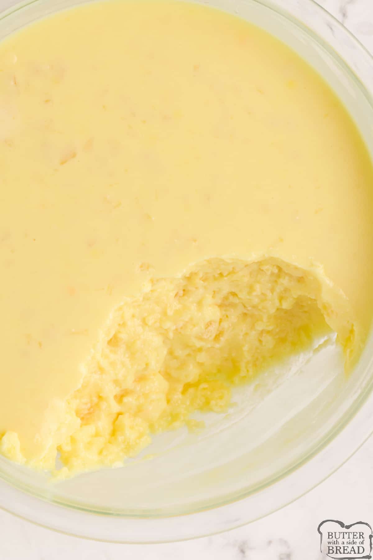 Creamy Pineapple Lemon Jello made with just 5 ingredients! This jello recipe is made with lemon pudding, lemon jello and crushed pineapple. 