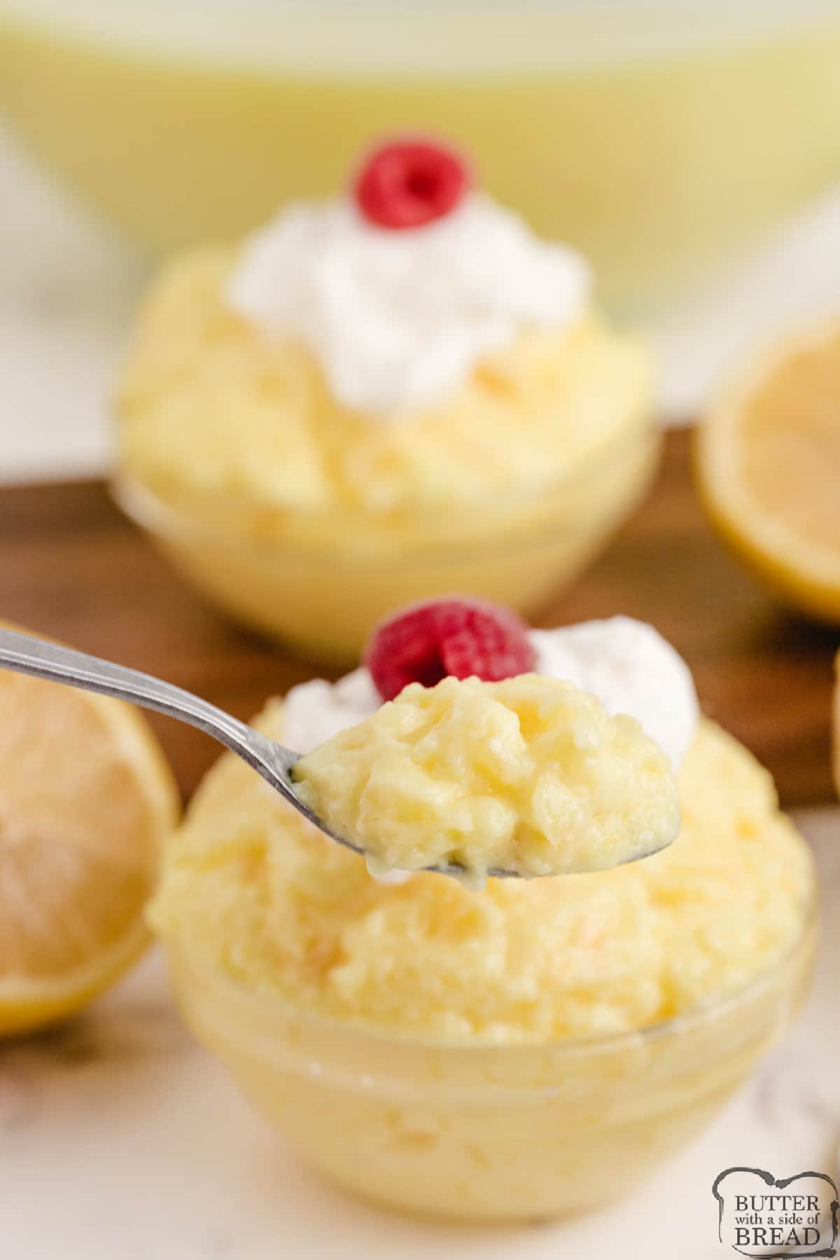 Spoonful of lemon jello mixed with lemon pudding and crushed pineapple