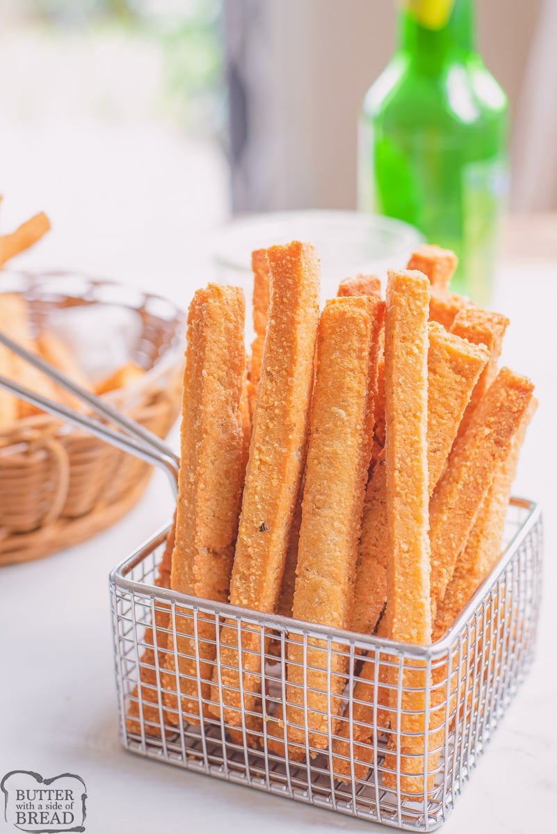 fried cheese straws served in a fryer basket