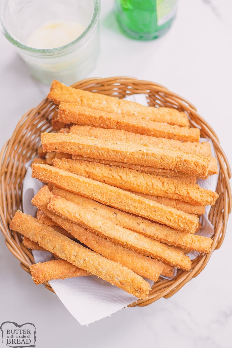 fried cheese straws served in a basket