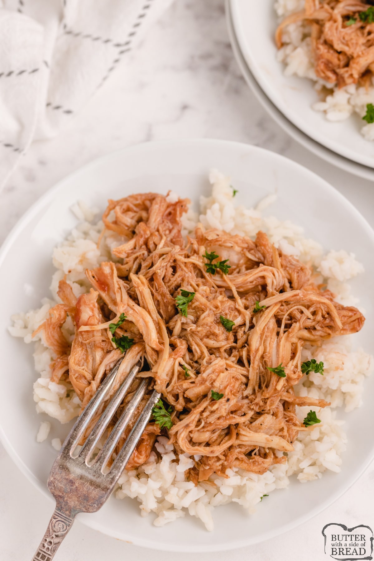 Slow Cooker Root Beer BBQ Chicken served over rice