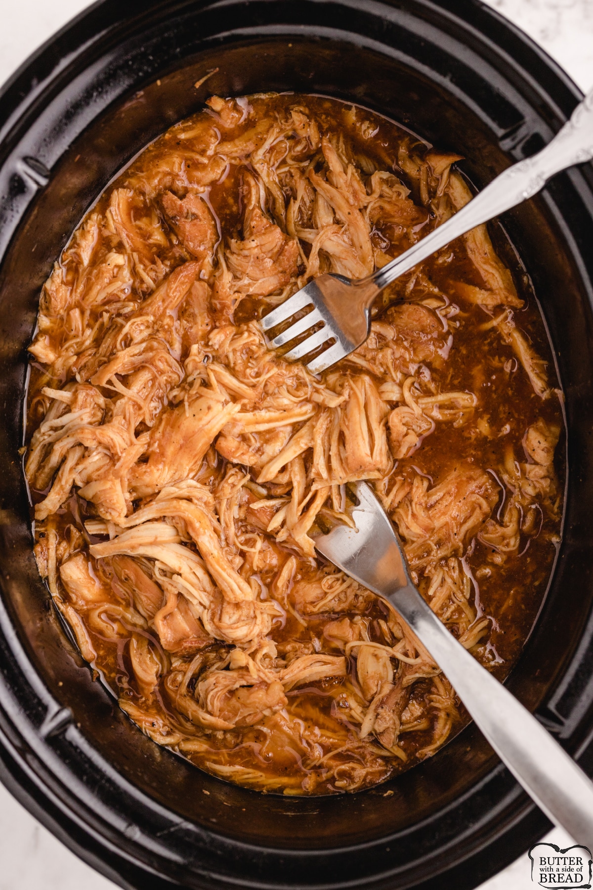 Slow Cooker Root Beer BBQ Chicken is made with chicken breasts, root beer and BBQ sauce - that's it! Tender, juicy barbecue chicken recipe that is perfect for sandwiches or served over rice. 