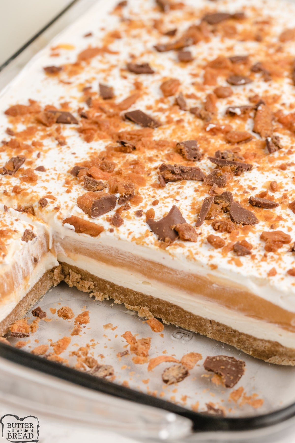 Butterscotch Lush is a no bake dessert made with a graham cracker crust topped with layers of sweetened cream cheese and butterscotch pudding. Simple butterscotch dessert that is assembled in minutes! 