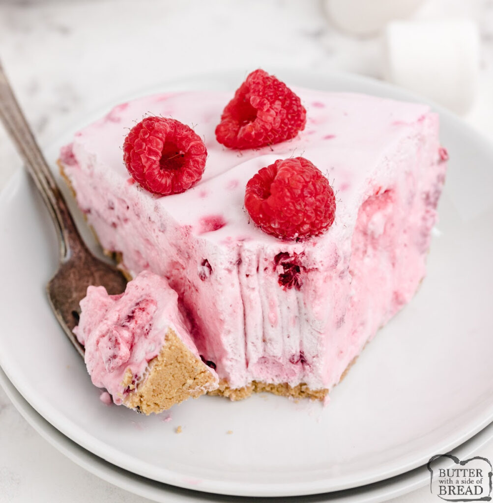 This easy No Bake Raspberry Marshmallow Pie comes together in minutes with just five simple ingredients for a light, creamy, fruity dessert!