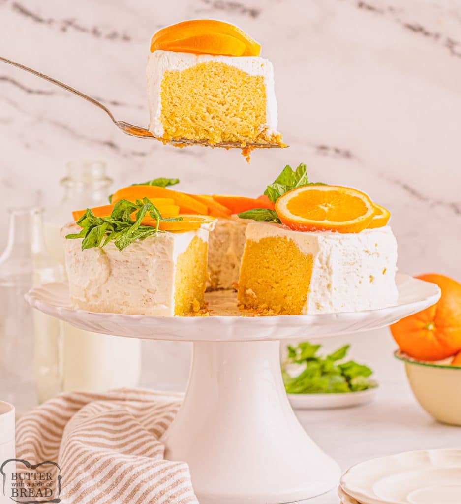 olive oil bundt cake on a white cake pedestal