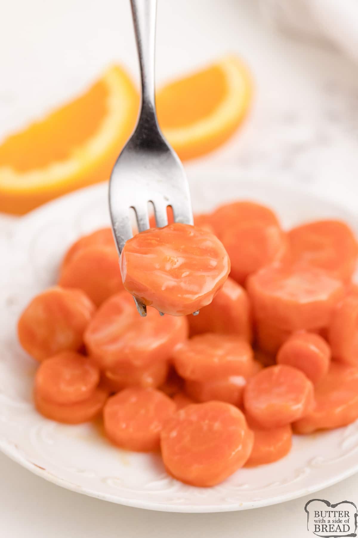 Tender carrots coated in a simple orange glaze
