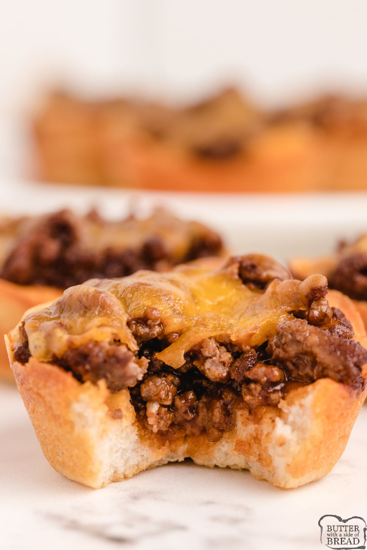 Refrigerated biscuit cups filled with ground beef and cheese