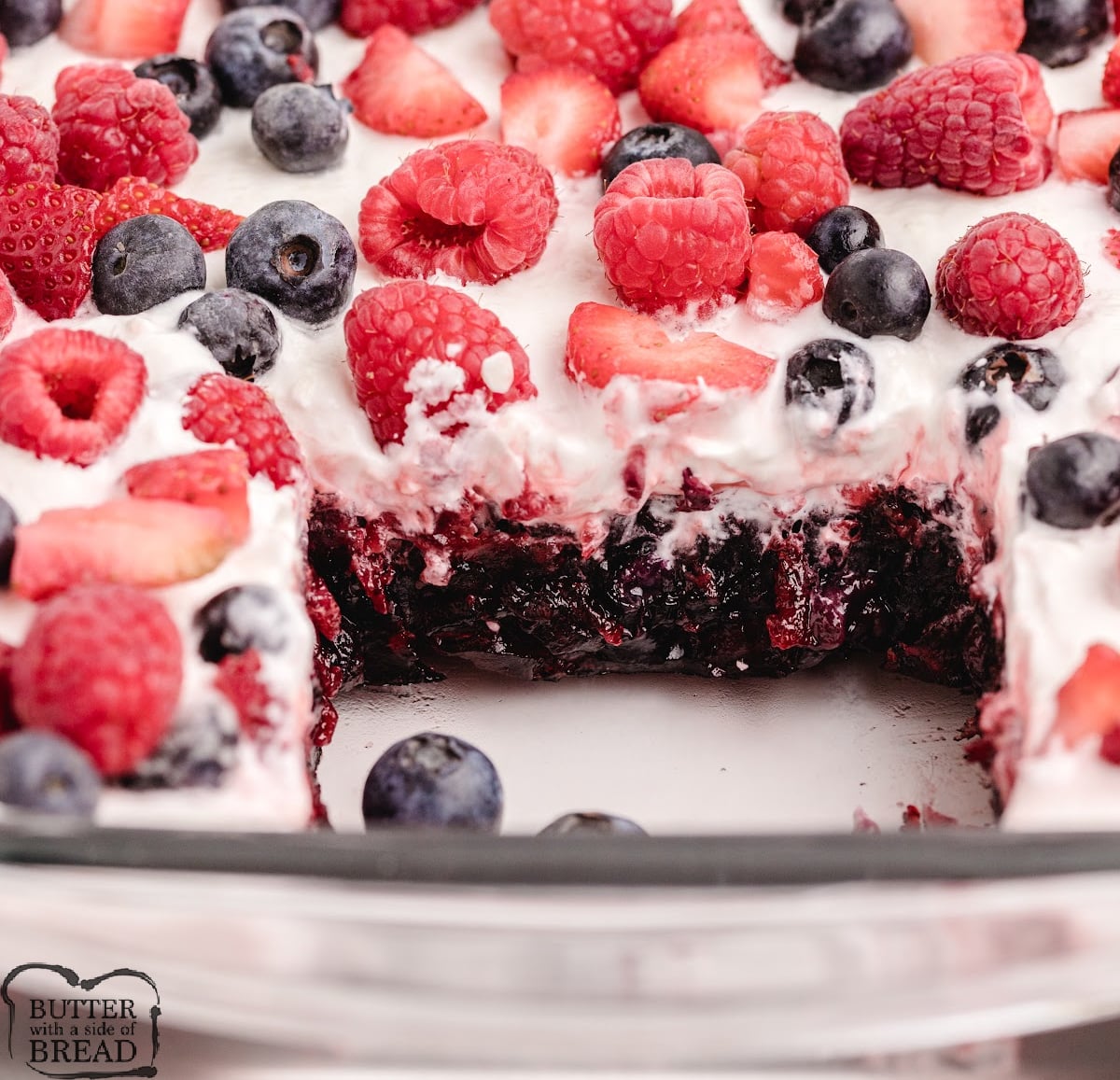 Blueberry Jello Salad is a quick and easy layered dessert made with berry gelatin, blueberry pie filling, and a fluffy cream topping. Perfect for holidays, potlucks, and summer gatherings!