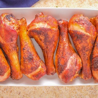 white tray with smoked chicken legs