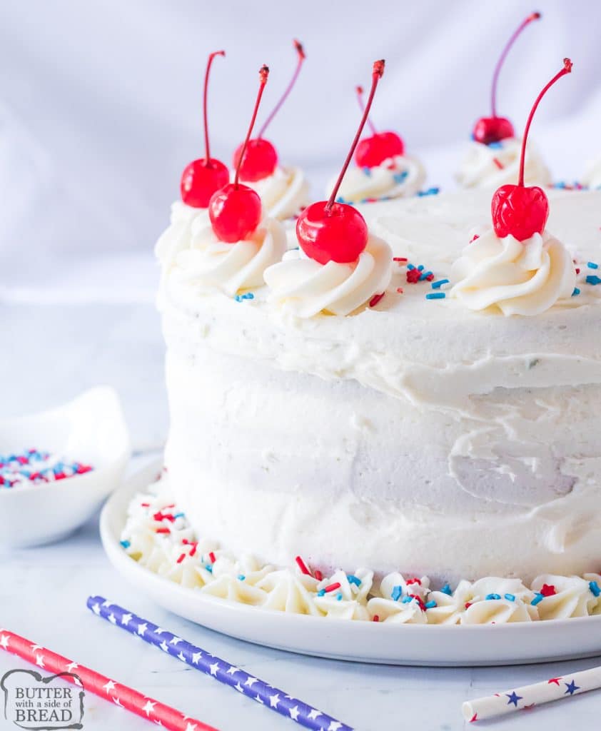 festive red, white and blue cake with cherries