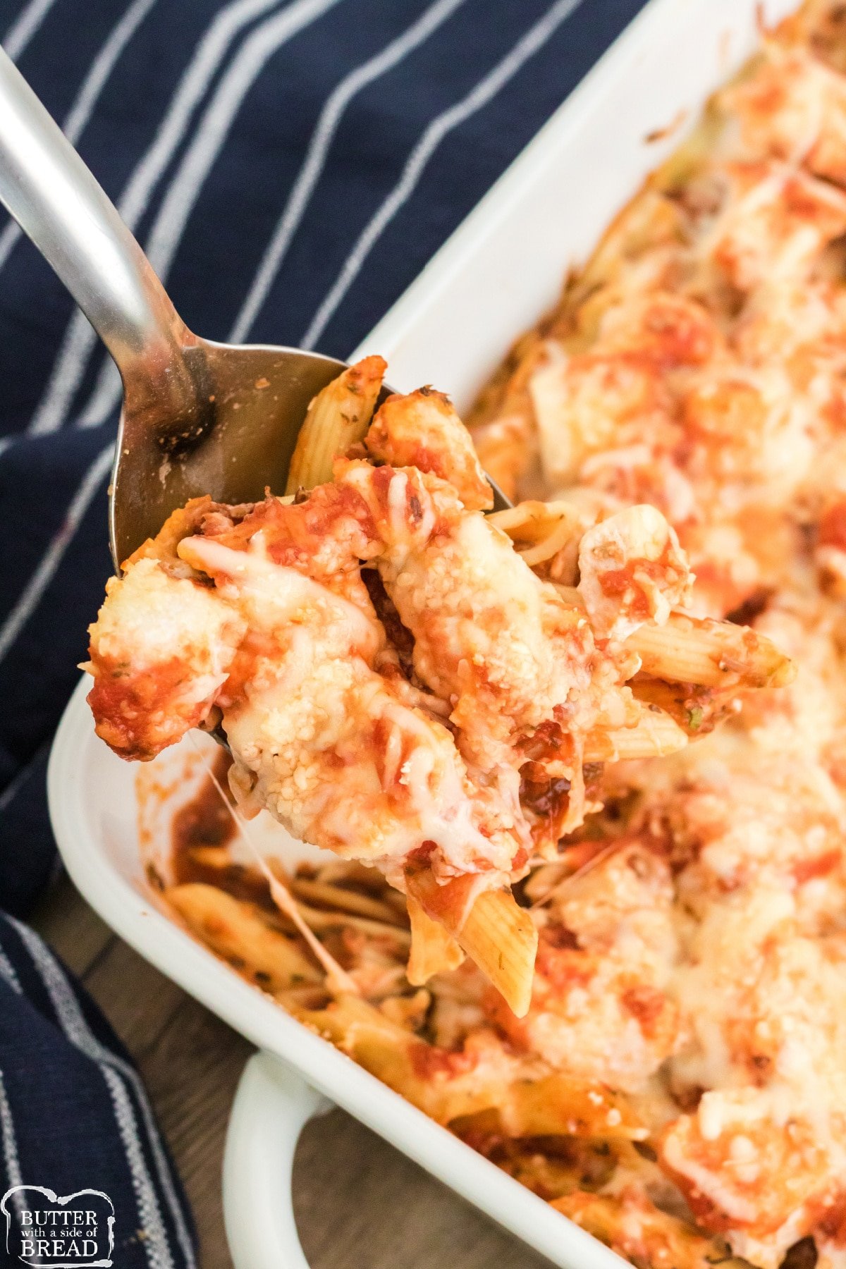 Baked Chicken Parmesan Casserole is an easy baked pasta dish made with penne, marinara sauce, mozzarella and chicken. Perfect weeknight dinner that the whole family will love! 