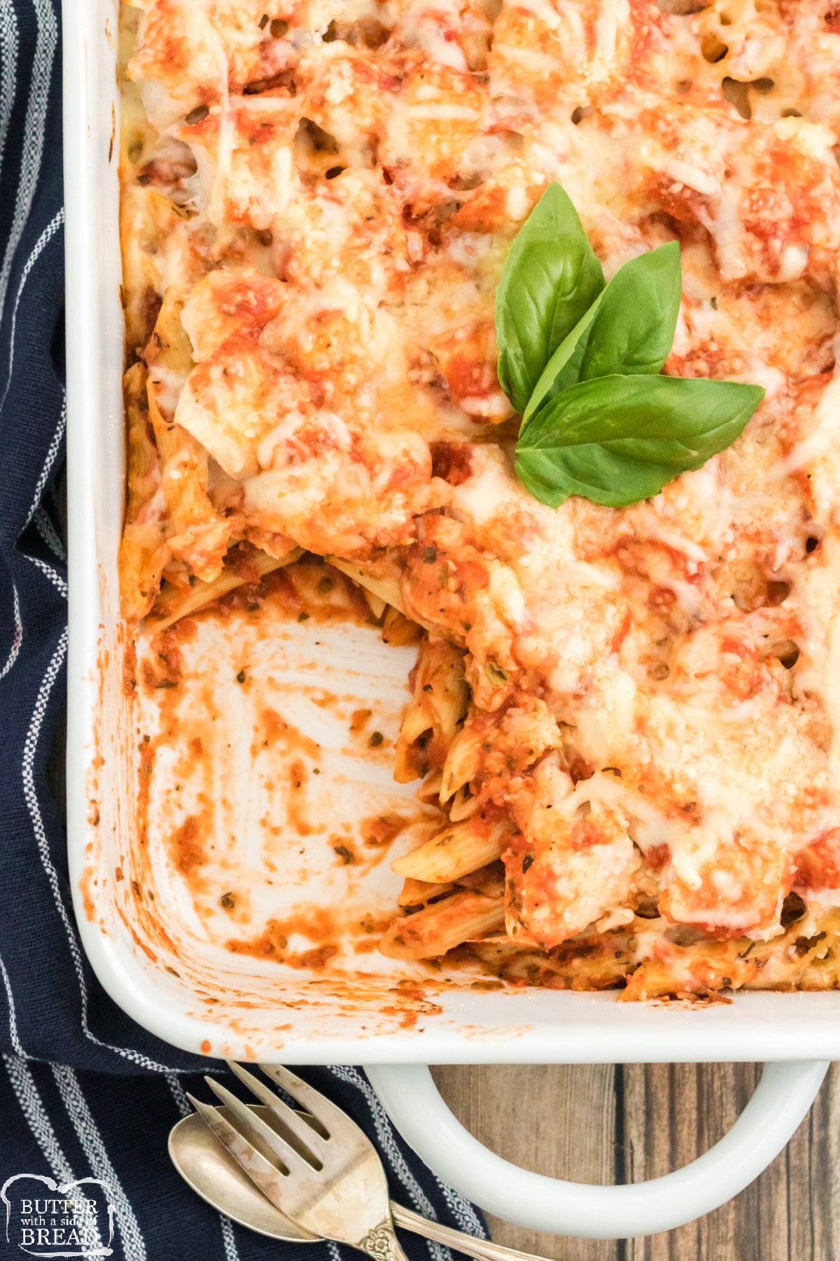 Baked Chicken Parmesan Casserole is an easy baked pasta dish made with penne, marinara sauce, mozzarella and chicken. Perfect weeknight dinner that the whole family will love! 