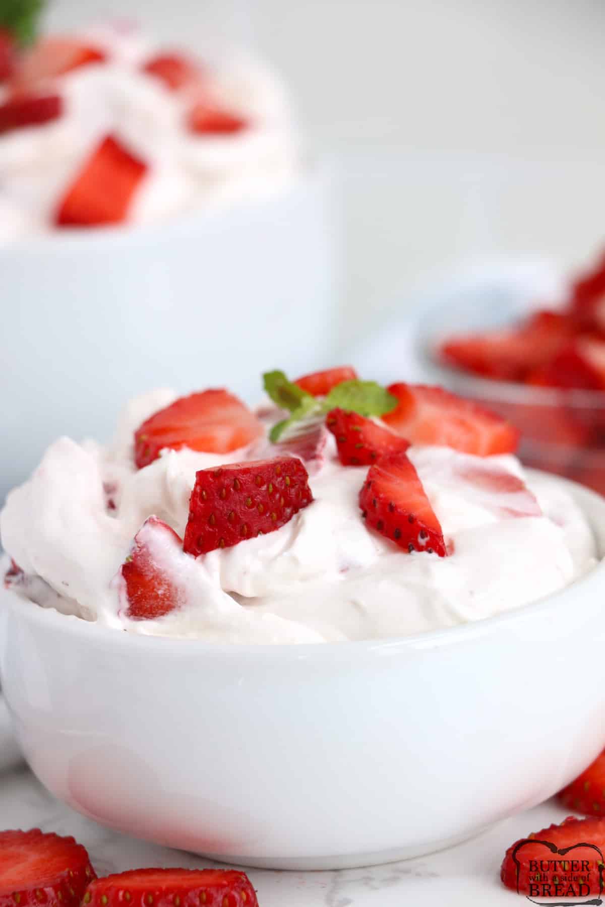 Strawberry Fluff Salad made with just 5 ingredients in less than 5 minutes! Perfectly sweet fluff recipe that can be served as a side dish or a dessert. 