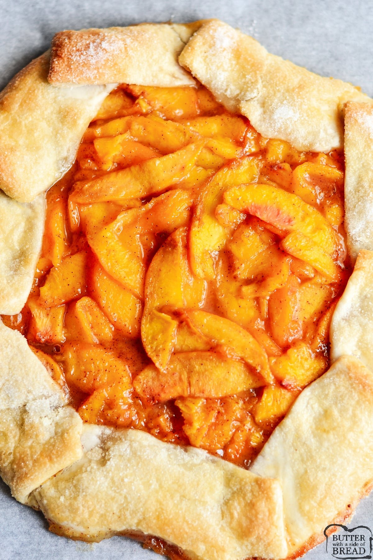 Easy Peach Galette made with fresh peaches and a simple pie crust recipe. Simple peach dessert that tastes even better with a scoop of vanilla ice cream!