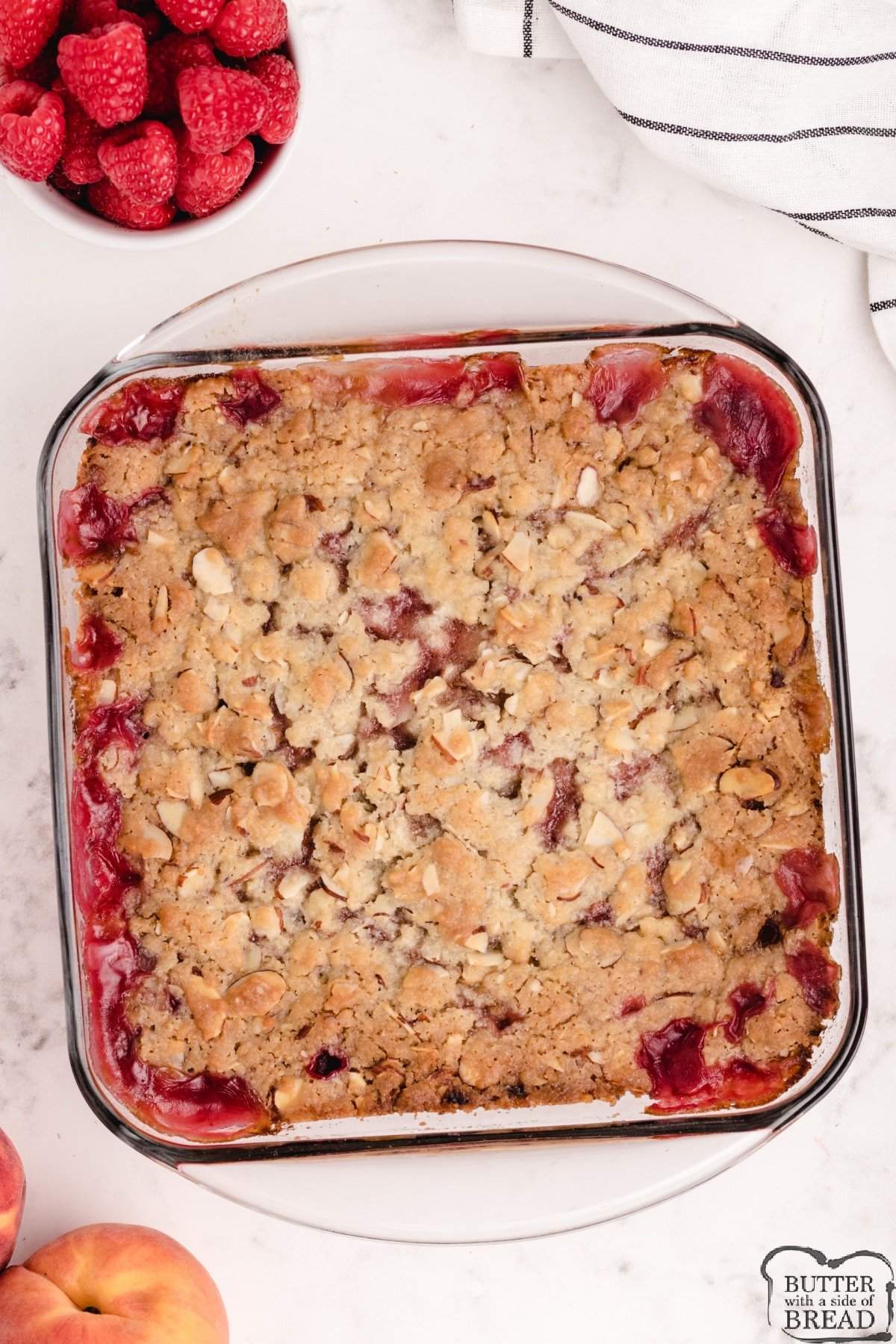 Crumble recipe made with peaches and raspberries