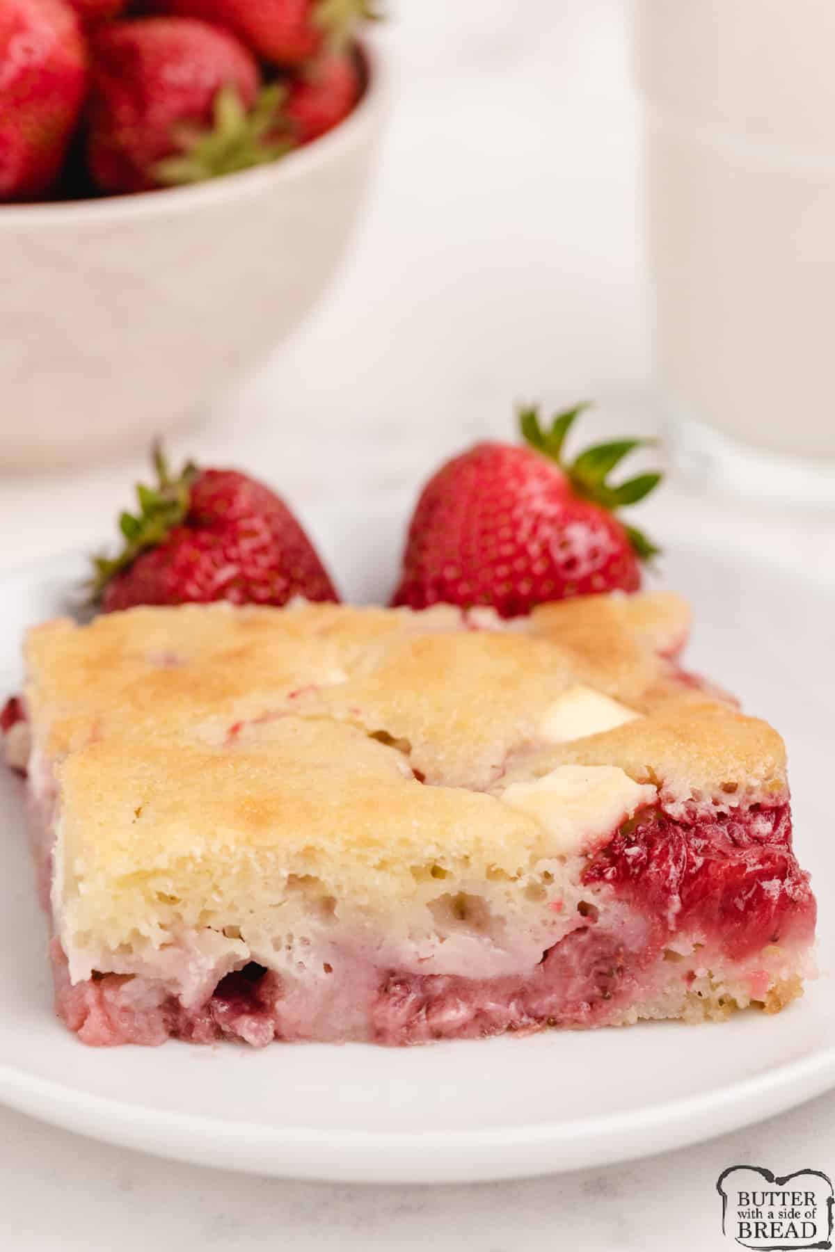 Strawberry Cream Cheese Cobbler made from scratch with fresh strawberries and bits of cream cheese. Sweet strawberry dessert that is delicious all year long! 