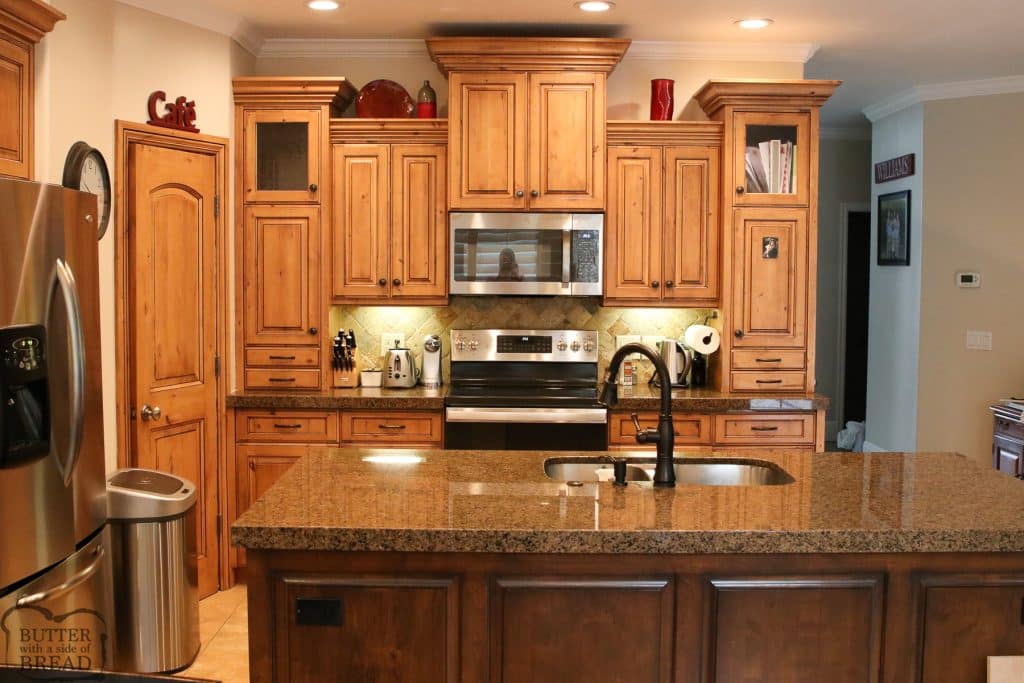 before kitchen remodel maple cabinets and dark granite countertops
