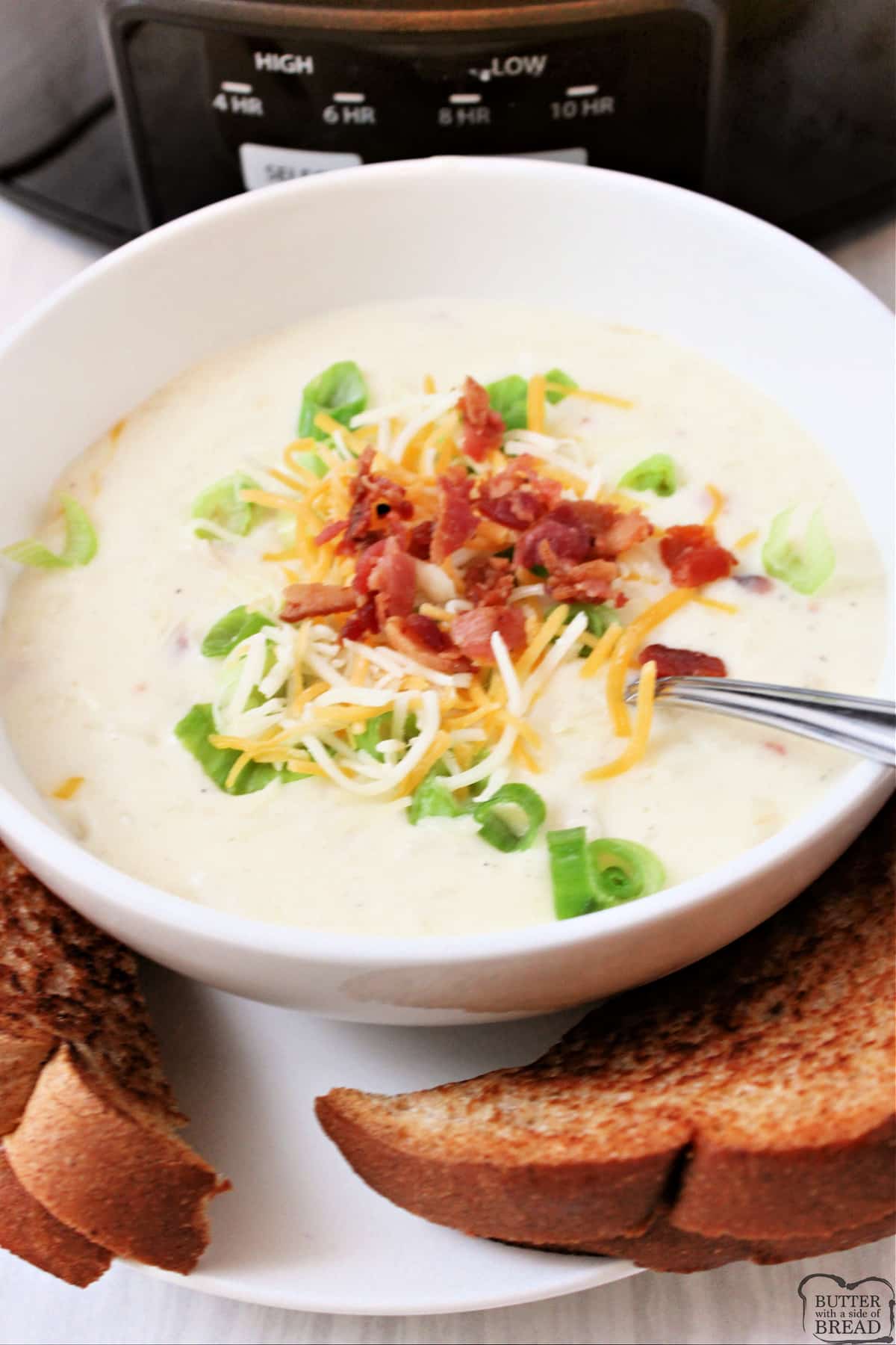 Crockpot Potato Soup is rich, creamy, cheesy and perfect for a chilly day. Delicious slow cooker potato soup recipe that is simple to make! 