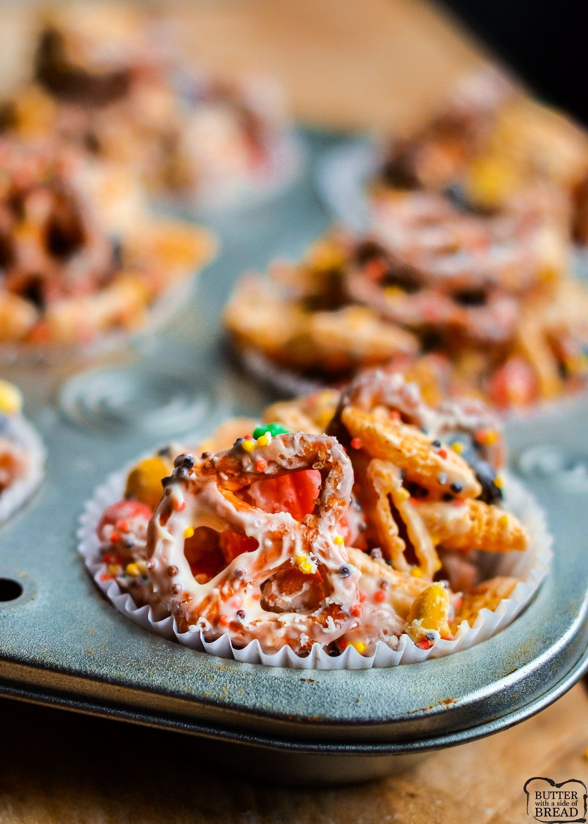 White chocolate snack mix in muffin tin