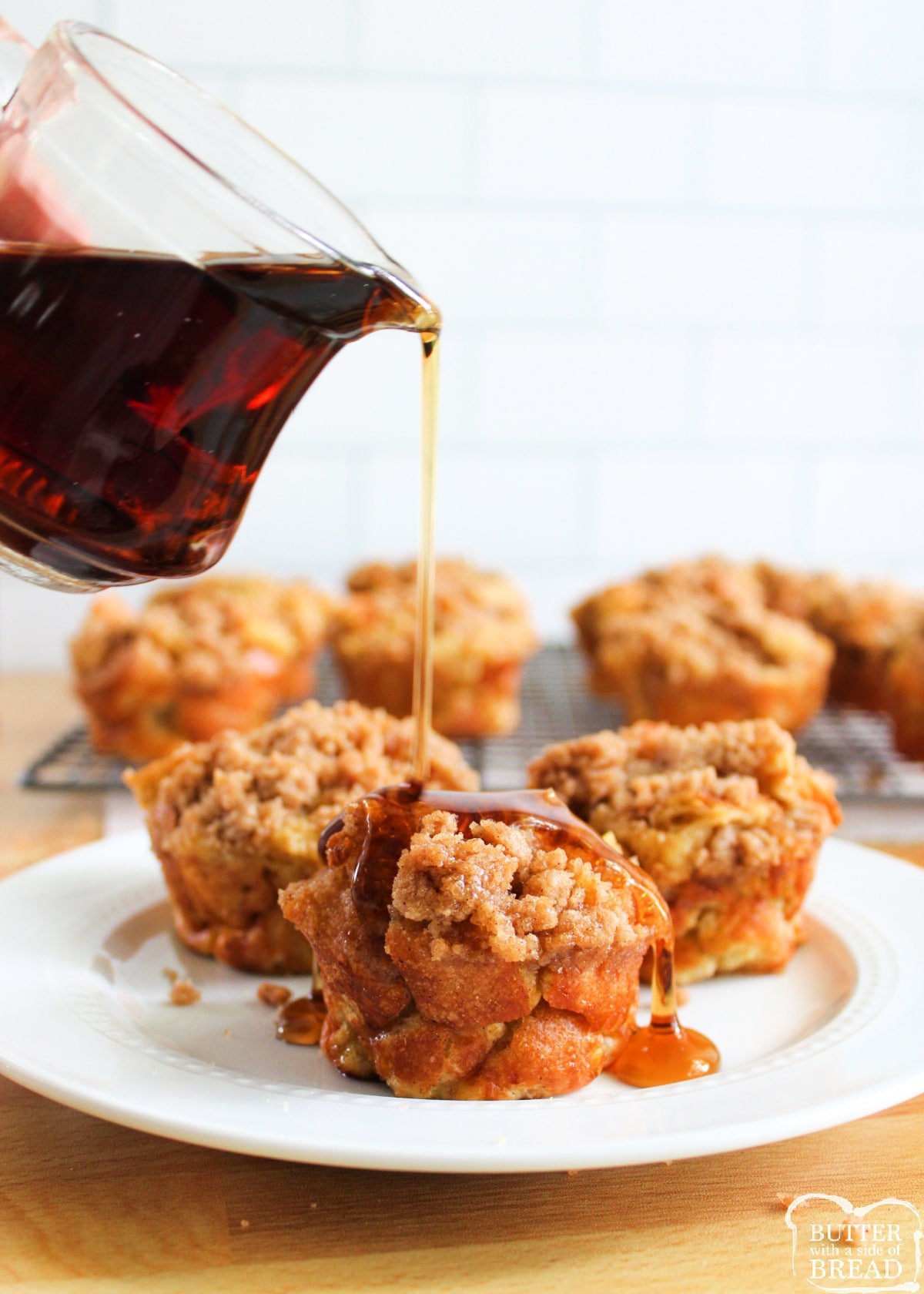 French Toast Muffins made with sourdough bread, milk and eggs and then topped with a simple cinnamon sugar streusel. Perfectly portioned servings of french toast baked in a muffin tin!