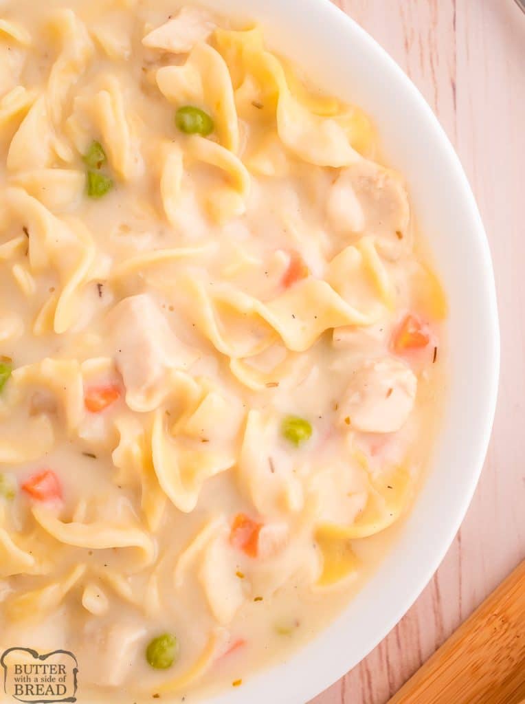 creamy chicken noodle soup with peas and carrots