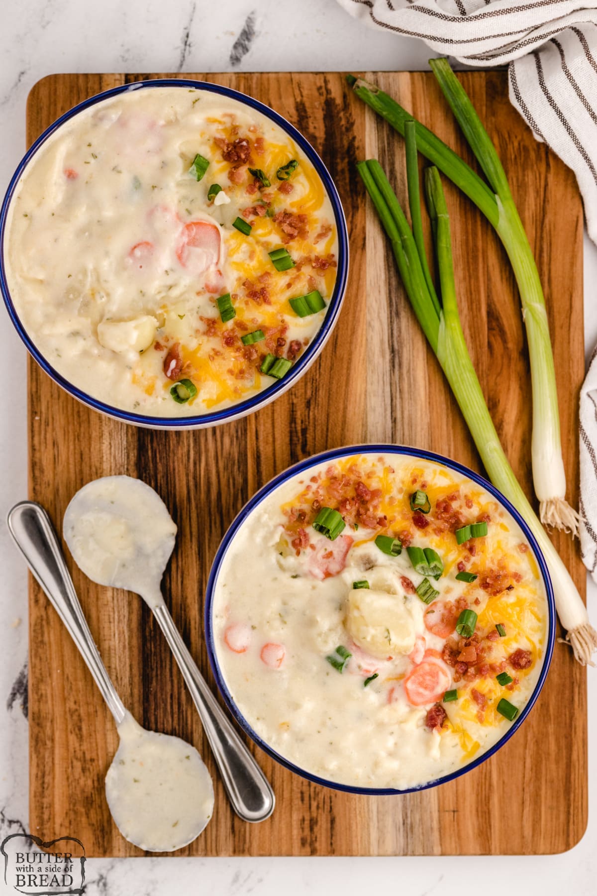 Bowls filled with potato cheese soup