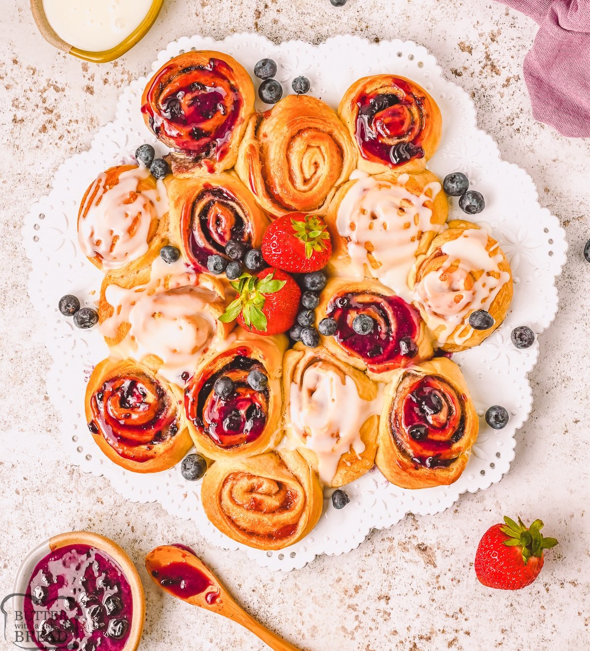 white tray with jelly crescents and berries