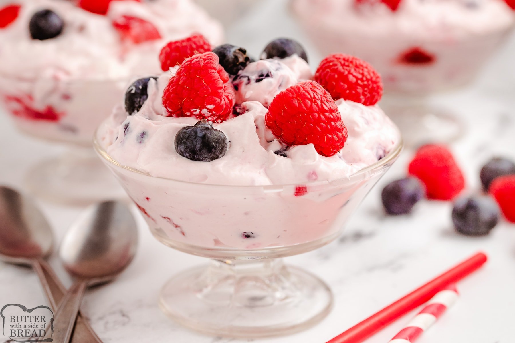 raspberries and blueberry salad with cream