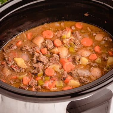 Best Crock Pot Beef Stew recipe made with tender chunks of beef, loads of vegetables and a simple mixture of broth and spices that yields incredible home style beef stew.