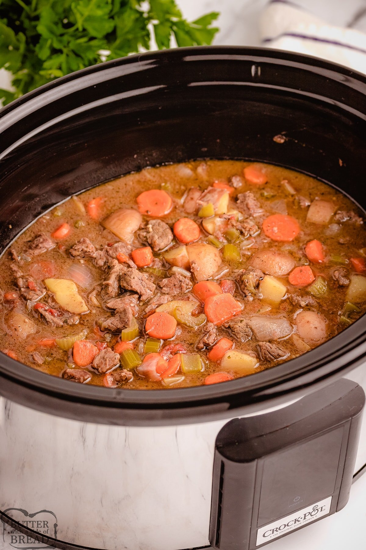 Best Crock Pot Beef Stew recipe made with tender chunks of beef, loads of vegetables and a simple mixture of broth and spices that yields incredible home style beef stew.