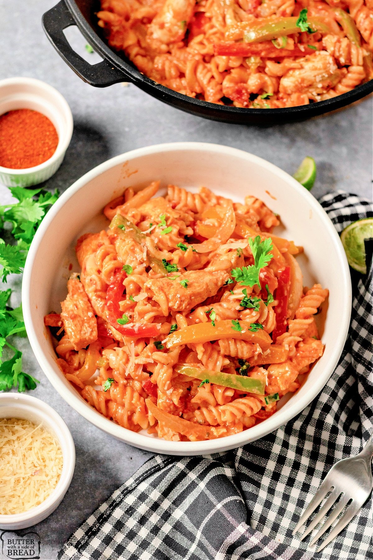 Chicken Fajita Pasta is creamy and loaded with flavor! Delicious one pot pasta recipe made with onions, peppers, cheese and chicken.