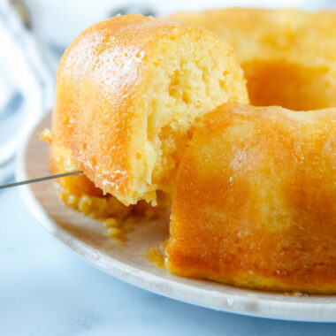 serving up a slice of pineapple bundt cake