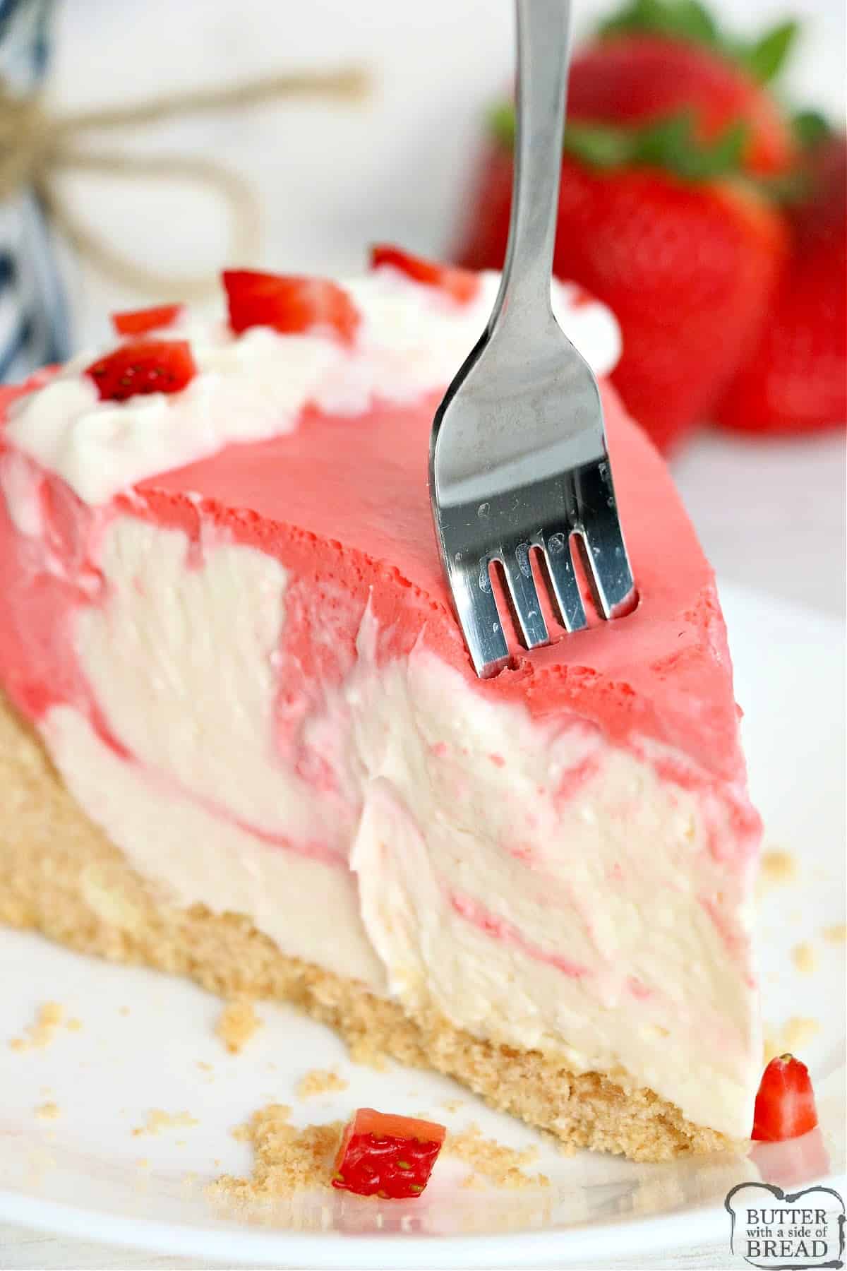 Slice of no bake strawberry cheesecake with Jello