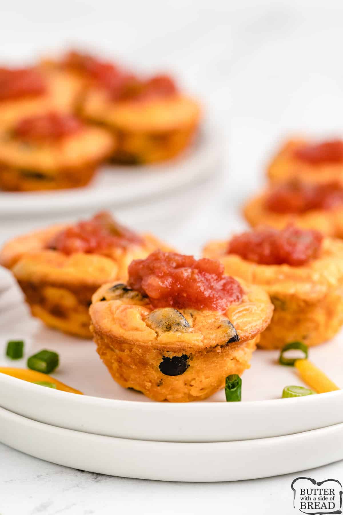 Bite-sized appetizer made with cheese, salsa and eggs. 