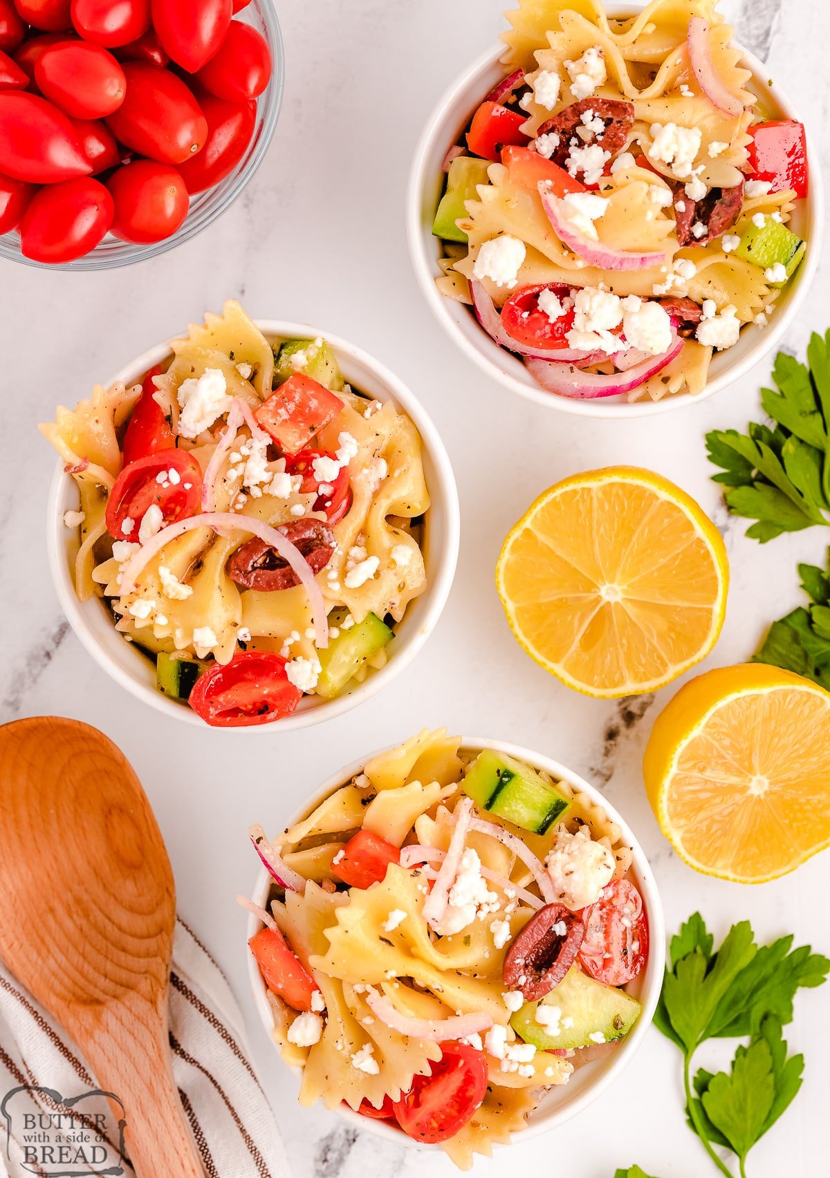 lemony Greek pasta salad in small serving bowls
