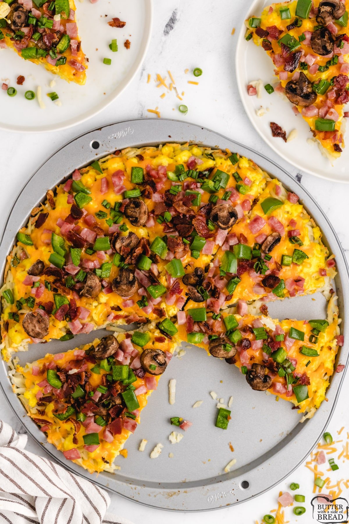 Breakfast pizza made with eggs, cheese and veggies