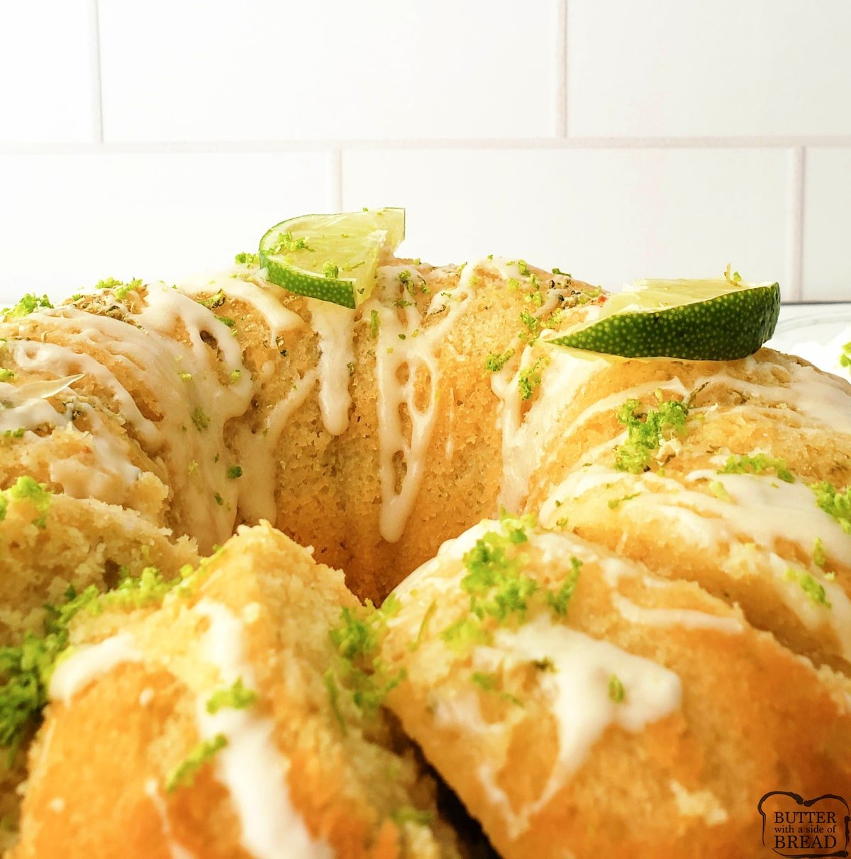 Key Lime Bundt Cake made with sour cream, lime zest and buttermilk. Delicious key lime bundt cake recipe with a simple powdered sugar glaze. 