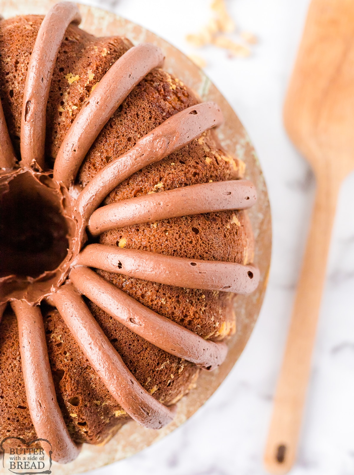 peanut butter banana bundt cake with thick lines of frosting